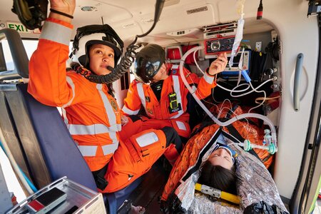 Great Western Air Ambulance crew in a helicopter.