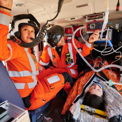 Great Western Air Ambulance crew in a helicopter.